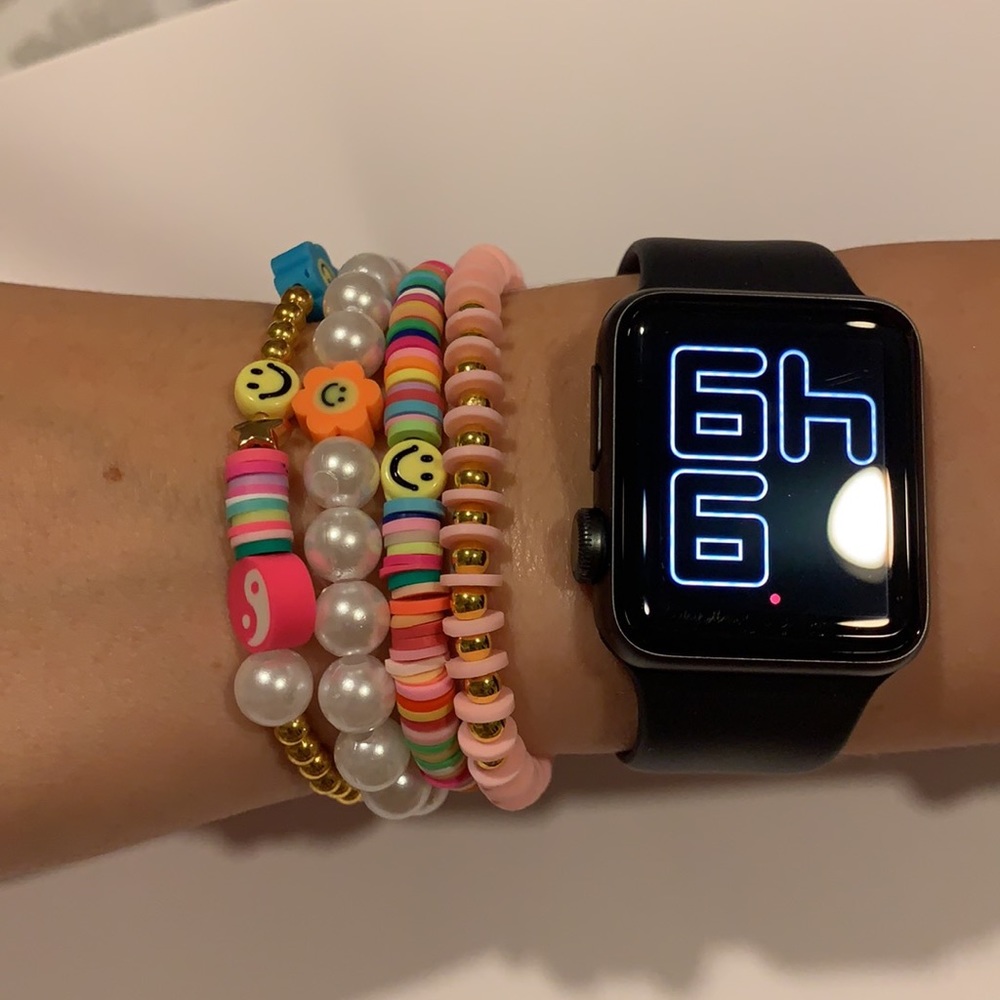 Multicolored bead bracelets.